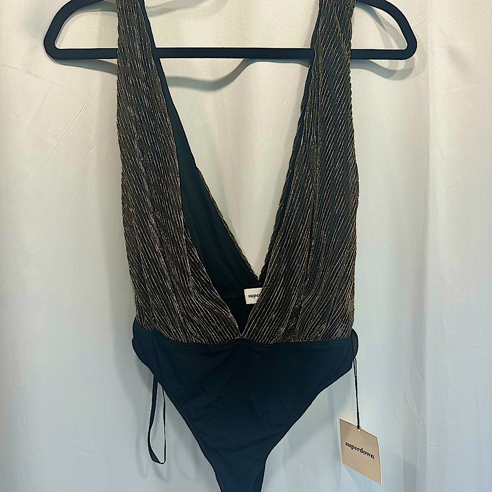 Superdown size small black and gold shimmer bodysuit.